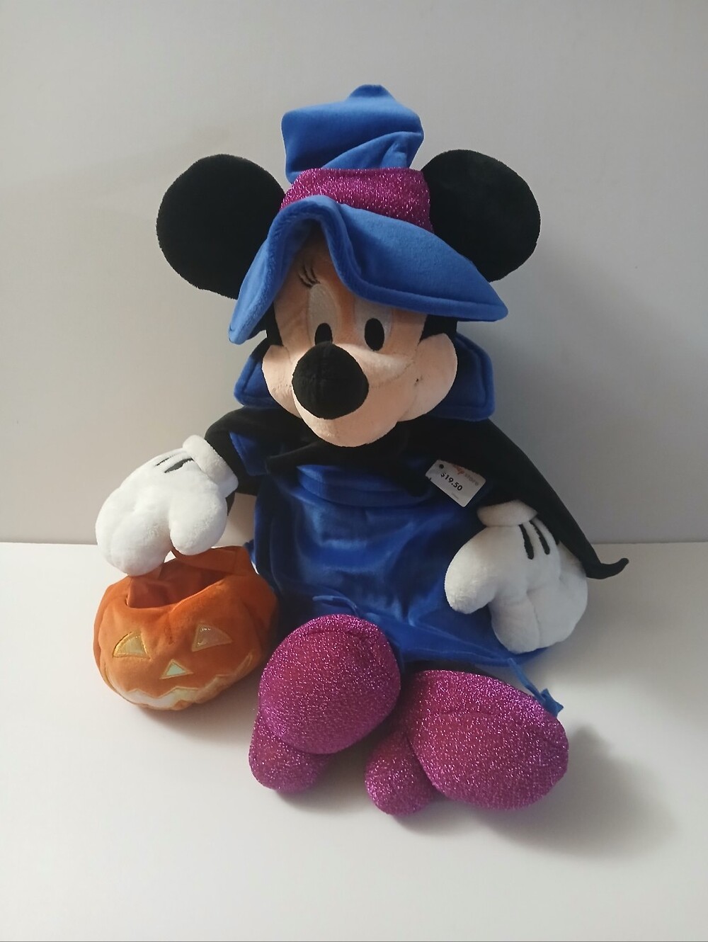 vintage Disney Store Halloween Minnie Mouse witch plush holding a small pumpkin